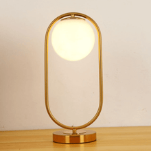 Load image into Gallery viewer, A gold Modern Golden Globe Table Lamp

