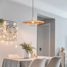 Load image into Gallery viewer, Japanese Style Metal Pendant Light hanging above dining table and white chairs
