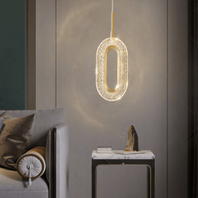 Load image into Gallery viewer, Diamond Style Pendant Light model B next to living room sofa
