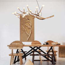Load image into Gallery viewer, Rustic Tree Branch Pendant Light above living room table
