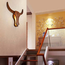 Load image into Gallery viewer, Retro Wooden Cow Light on wall above stairs
