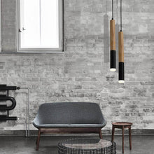 Load image into Gallery viewer, Black Nordic Wood Pendant Lights above sofa and coffee table in living room
