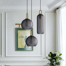 Load image into Gallery viewer, Smoky Glass Pendant Lights in living room
