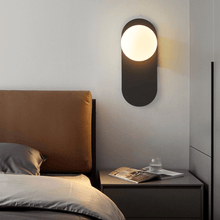 Load image into Gallery viewer, Black Flat Base Globe Light above bedside table next to bed
