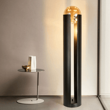 Load image into Gallery viewer, Amber Nordic Metal Floor Lamp next to coffee table
