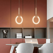 Load image into Gallery viewer, Two Nordic Shaped Pendant Lights above living room table with laptop on
