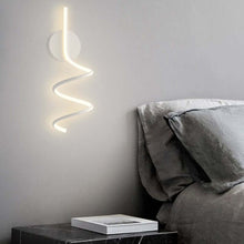 Load image into Gallery viewer, White Nordic Spiral Wall Light on wall above bedside table
