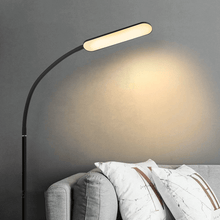 Load image into Gallery viewer, Black Adjustable LED Reading Lamp next to sofa

