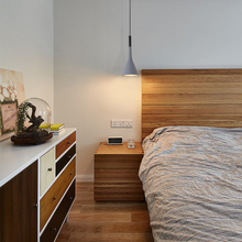 Load image into Gallery viewer, Grey Nordic Hanging Pendant Light above alarm clock on bedside table
