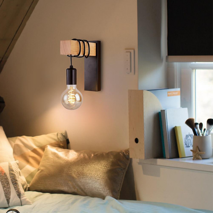 Industrial Exposed Bulb on wall above bed in bedroom