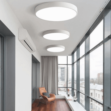 Load image into Gallery viewer, White Ultra-Thin LED Ceiling Lights in high-rise living room hallway
