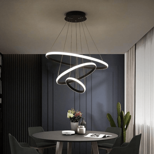 Black LED Ring Chandelier above dining room table