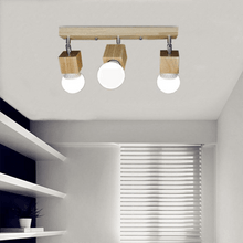 Load image into Gallery viewer, Multi-Headed Nordic Wooden Light on ceiling of walk-in closet

