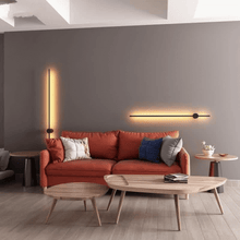 Load image into Gallery viewer, Two Nordic LED Pole Lights above red sofa in living room
