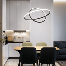 Load image into Gallery viewer, Black LED Ring Chandelier above kitchen table
