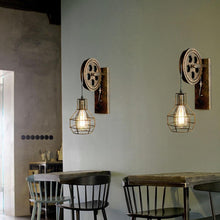 Load image into Gallery viewer, Vintage Rusted Wall Lights above tables
