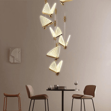Load image into Gallery viewer, Butterfly Pendant Light above living room coffee table
