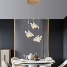 Load image into Gallery viewer, Butterfly Pendant Light above breakfast table
