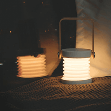 Load image into Gallery viewer, Cavelights Portable Night Light on bed
