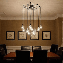 Load image into Gallery viewer, Cavelights Spider Chandelier above dining table
