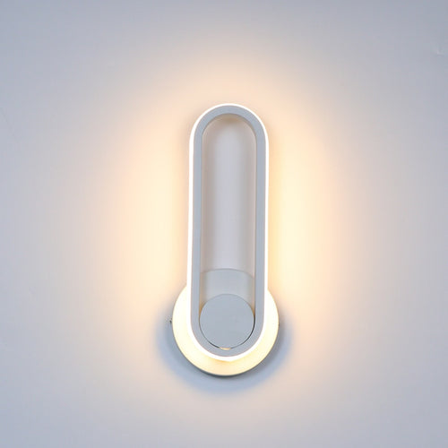 White Circular Bedside Wall Light on wall