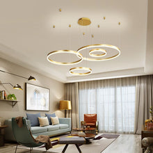 Load image into Gallery viewer, Gold Circle LED Chandelier in living room
