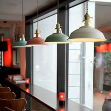 Load image into Gallery viewer, Industrial Coloured Pendant Lights above restaurant seating area
